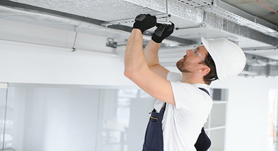 ventilation system installation and repair service. hvac technician at work. banner copy space